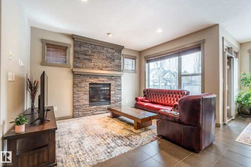 1503 Malone Close, Edmonton, AB - Indoor Photo Showing Living Room With Fireplace