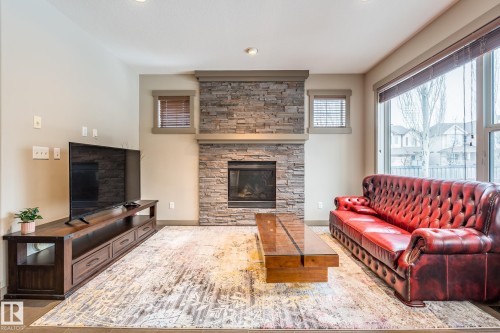 1503 Malone Close, Edmonton, AB - Indoor Photo Showing Living Room With Fireplace