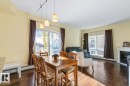 202 10524 77 Avenue, Edmonton, AB  - Indoor Photo Showing Dining Room With Fireplace 