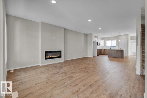 21 Ficus Way, Fort Saskatchewan, AB - Indoor Photo Showing Living Room With Fireplace