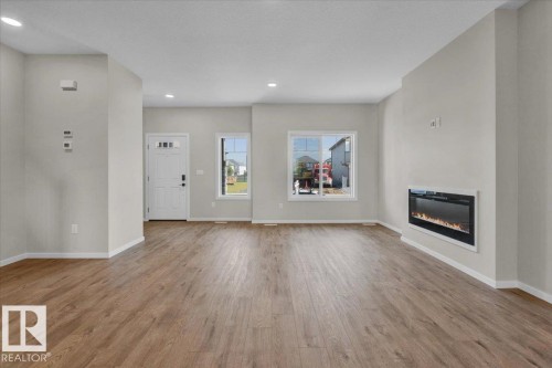 21 Ficus Way, Fort Saskatchewan, AB - Indoor Photo Showing Living Room With Fireplace