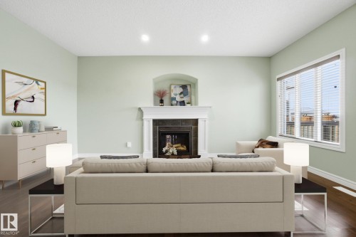 108 South Creek Wynd, Stony Plain, AB - Indoor Photo Showing Living Room With Fireplace