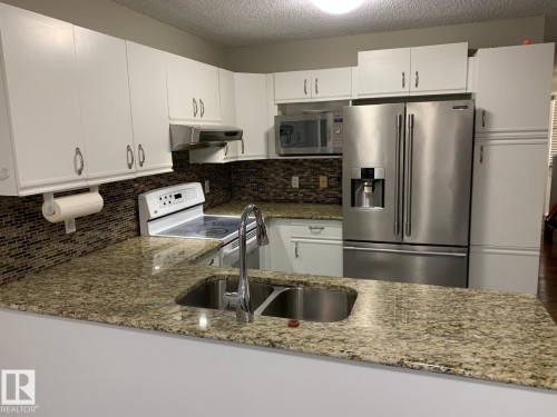 1535 80A Street, Edmonton, AB - Indoor Photo Showing Kitchen With Double Sink