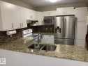 1535 80A Street, Edmonton, AB  - Indoor Photo Showing Kitchen With Double Sink 