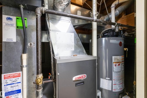 Utilities with gas water heater and heating unit - 9804 156 Avenue, Edmonton, AB - Indoor Photo Showing Basement