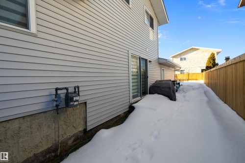 View of snow covered exterior - 9804 156 Avenue, Edmonton, AB - Outdoor With Exterior