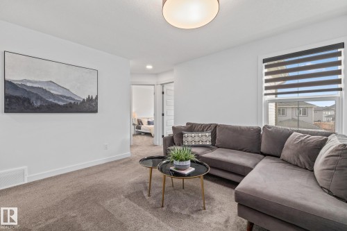 664 Astoria Way, Devon, AB - Indoor Photo Showing Living Room