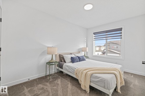 664 Astoria Way, Devon, AB - Indoor Photo Showing Bedroom