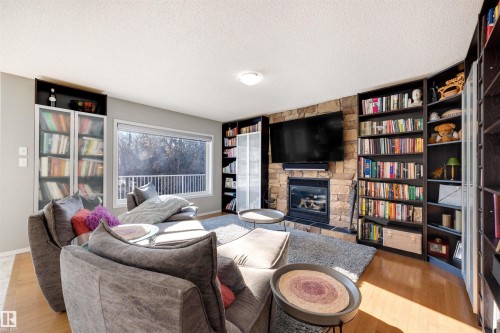 172 52216 Range Road 233, Rural Strathcona County, AB - Indoor Photo Showing Living Room With Fireplace