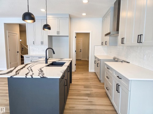 219 Ravine Drive, Devon, AB - Indoor Photo Showing Kitchen With Double Sink With Upgraded Kitchen
