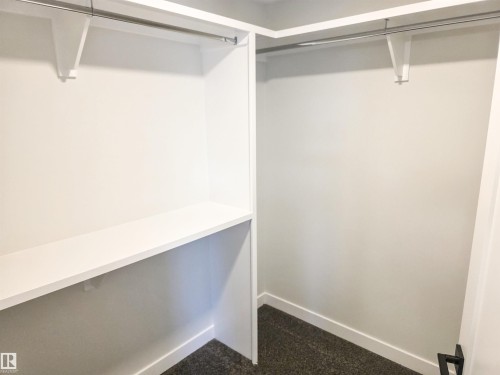 219 Ravine Drive, Devon, AB - Indoor With Storage