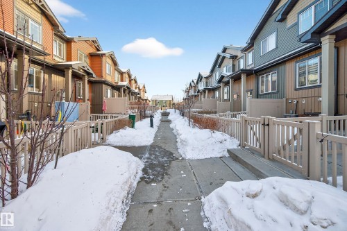 View of property's community featuring a residential view - 103 3305 Orchards Link Link, Edmonton, AB - Outdoor