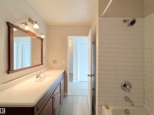 Full bathroom with tub / shower combination and vanity - 11357 22 Avenue, Edmonton, AB - Indoor Photo Showing Bathroom