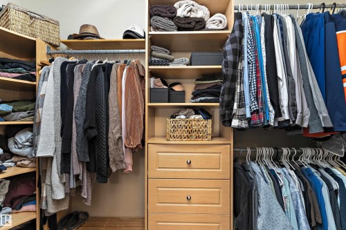 View of walk in closet - 317 Grand Meadow Crescent, Edmonton, AB - Indoor With Storage