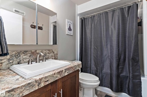 Full bath with vanity and shower / tub combo - 317 Grand Meadow Crescent, Edmonton, AB - Indoor Photo Showing Bathroom