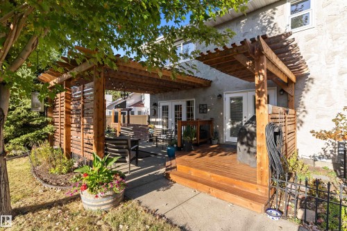 Wooden terrace with french doors and a pergola - 317 Grand Meadow Crescent, Edmonton, AB - Outdoor