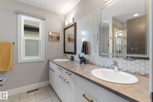 Featuring dual sink vanity and walk in shower - 89 Hewitt Circle, Spruce Grove, AB - Indoor Photo Showing Bathroom