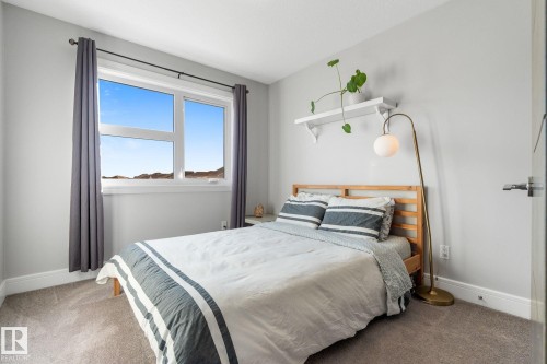 Bedroom with carpet flooring - 89 Hewitt Circle, Spruce Grove, AB - Indoor Photo Showing Bedroom