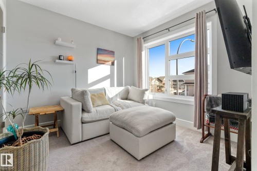 Bedroom featuring carpet floors and a closet - 89 Hewitt Circle, Spruce Grove, AB - Indoor Photo Showing Living Room