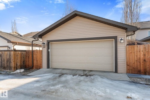 Back alley view of the Detached Garage - 89 Hewitt Circle, Spruce Grove, AB - Outdoor With Exterior