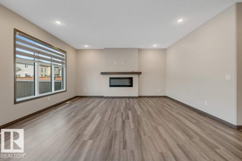 820 177 Street, Edmonton, AB - Indoor Photo Showing Other Room With Fireplace