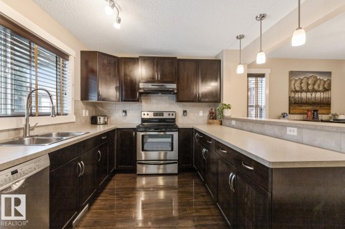 208 57 Street, Edmonton, AB - Indoor Photo Showing Kitchen With Stainless Steel Kitchen With Double Sink