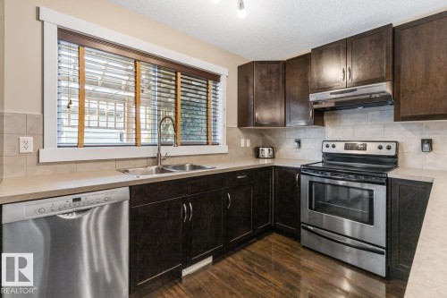 208 57 Street, Edmonton, AB - Indoor Photo Showing Kitchen With Stainless Steel Kitchen With Double Sink
