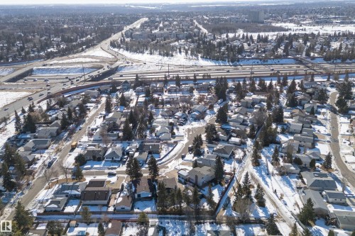 Snowy aerial view featuring a residential view - 17116 81 Avenue, Edmonton, AB - Outdoor With View