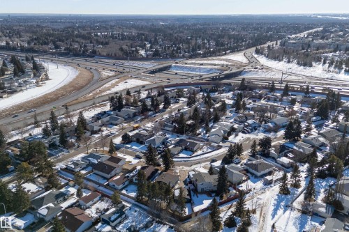 Snowy aerial view featuring a residential view - 17116 81 Avenue, Edmonton, AB - Outdoor With View