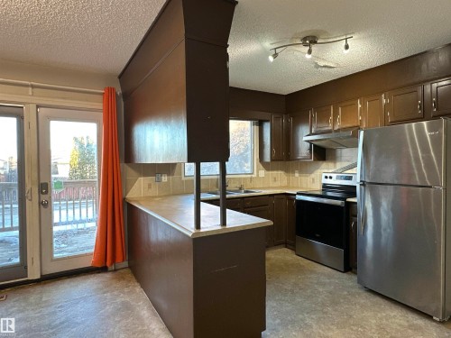 10512 21 Avenue, Edmonton, AB - Indoor Photo Showing Kitchen