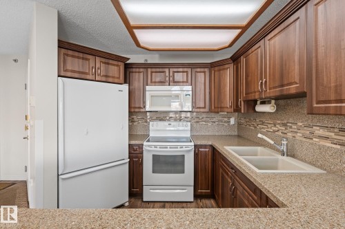 407 5204 25 Avenue, Edmonton, AB - Indoor Photo Showing Kitchen With Double Sink
