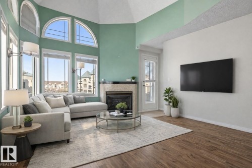 407 5204 25 Avenue, Edmonton, AB - Indoor Photo Showing Living Room With Fireplace