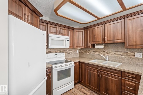 407 5204 25 Avenue, Edmonton, AB - Indoor Photo Showing Kitchen With Double Sink