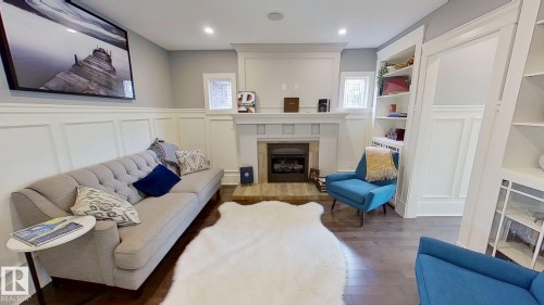 11313 127 Street Nw, Edmonton, AB - Indoor Photo Showing Living Room With Fireplace