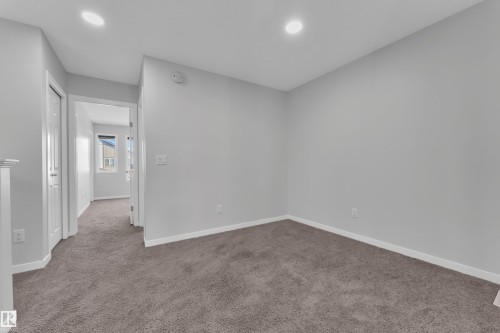 Spare room featuring carpet floors and recessed lighting - 1235 16 Avenue, Edmonton, AB - Indoor Photo Showing Other Room