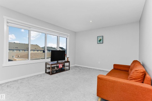 Sitting room with light carpet and recessed lighting - 3108 158 Street, Edmonton, AB - Indoor