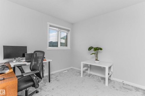 Office space with light carpet and baseboards - 3108 158 Street, Edmonton, AB - Indoor Photo Showing Office