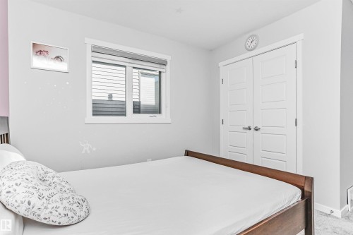 Bedroom with a closet and carpet - 3108 158 Street, Edmonton, AB - Indoor Photo Showing Bedroom
