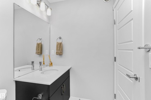 Half bath with vanity and toilet - 3108 158 Street, Edmonton, AB - Indoor Photo Showing Bathroom