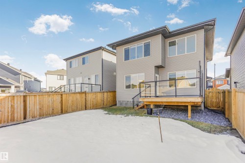Rear view of property with a fenced backyard and a deck - 3108 158 Street, Edmonton, AB - Outdoor With Deck Patio Veranda With Exterior