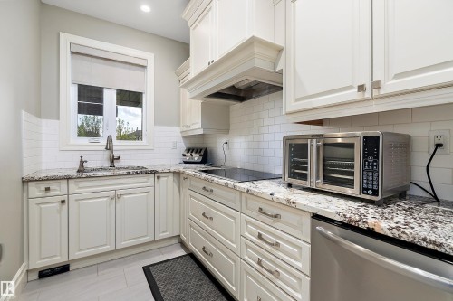 3054 Watson Landing Sw, Edmonton, AB - Indoor Photo Showing Kitchen With Upgraded Kitchen