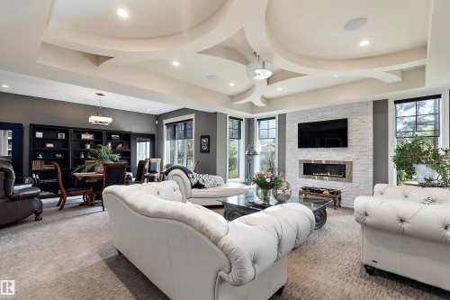 3054 Watson Landing Sw, Edmonton, AB - Indoor Photo Showing Living Room With Fireplace