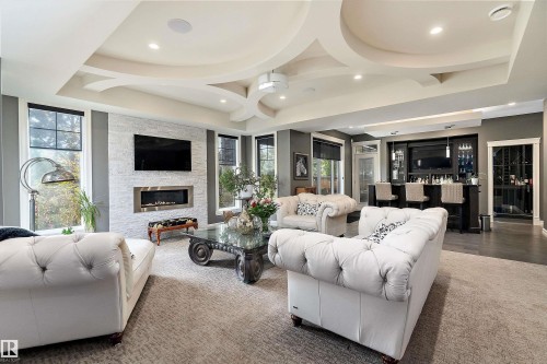 3054 Watson Landing Sw, Edmonton, AB - Indoor Photo Showing Other Room With Fireplace