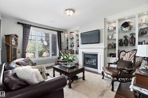 3054 Watson Landing Sw, Edmonton, AB - Indoor Photo Showing Living Room With Fireplace