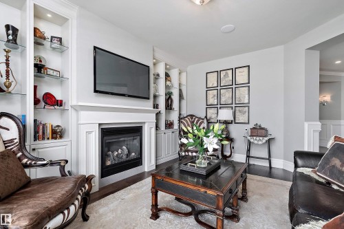 3054 Watson Landing Sw, Edmonton, AB - Indoor Photo Showing Living Room With Fireplace