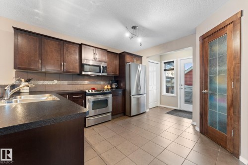 181 62 St, Edmonton, AB - Indoor Photo Showing Kitchen With Double Sink
