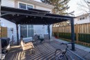 Fenced backyard with a patio, a gazebo, and grilling area - 4371 46 Street, Stony Plain, AB  - Outdoor With Exterior 