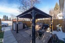 View of patio with a gazebo and a gate - 4371 46 Street, Stony Plain, AB  - Outdoor 