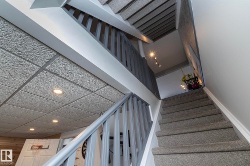 Stairs featuring recessed lighting - 4371 46 Street, Stony Plain, AB - Indoor Photo Showing Other Room