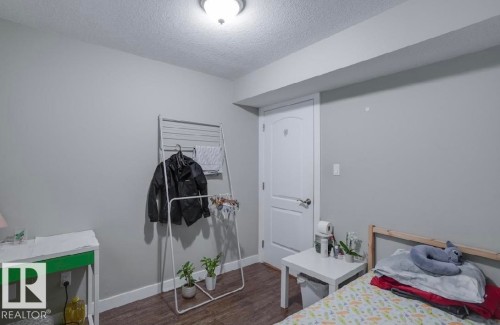 10935 76 Avenue, Edmonton, AB - Indoor Photo Showing Bedroom